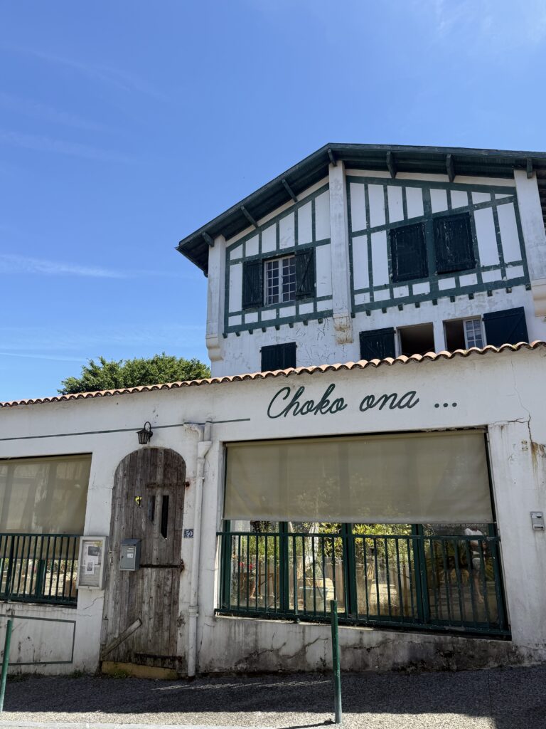 Traditional red and white Basque houses in the village of Guéthary, France