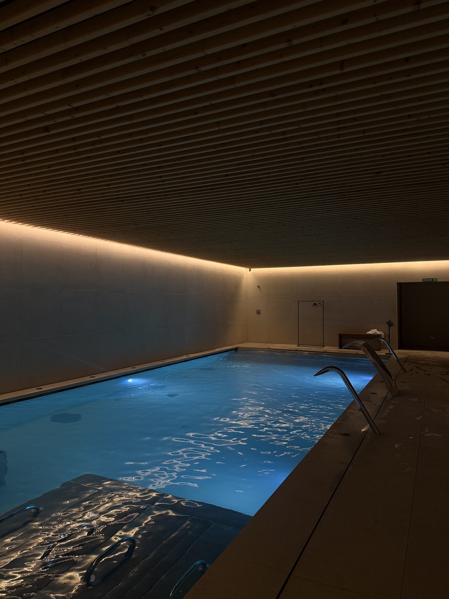 Indoor hydrotherapy pool with warm lighting at Foresta Wellness spa, Arima Hotel San Sebastián