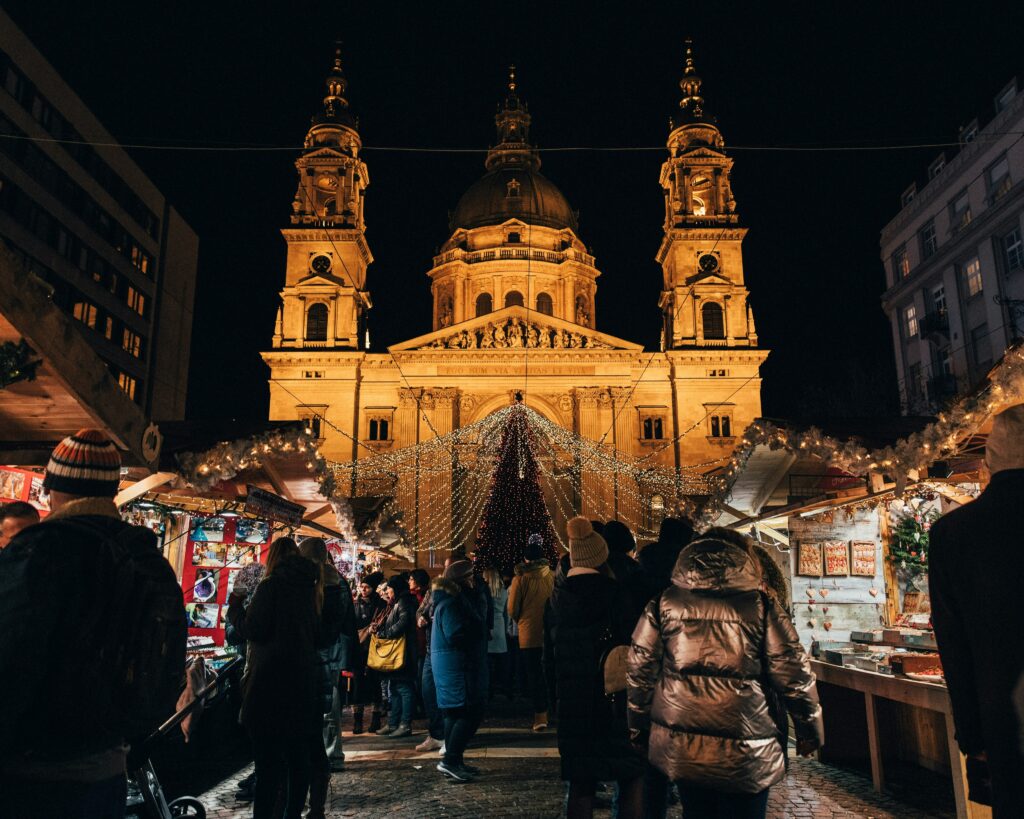 Budapest Christmas market in front of the illuminated St Stephen's Basilica at night